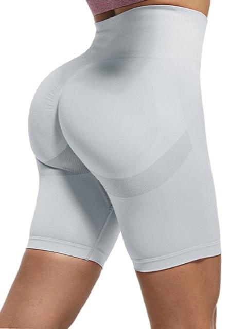 Model wearing Premium Fitness Yoga Shorts in Aqua Blue, showcasing comfort and style during a workout.   0000068