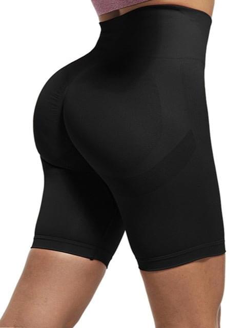 Model wearing Premium Fitness Yoga Shorts in Aqua Blue, showcasing comfort and style during a workout.   000006