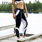 Woman wearing high waist sports legging with elastic waistband for yoga and fitness