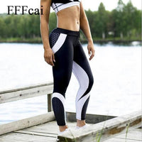 Woman wearing high waist sports legging with elastic waistband for yoga and fitness